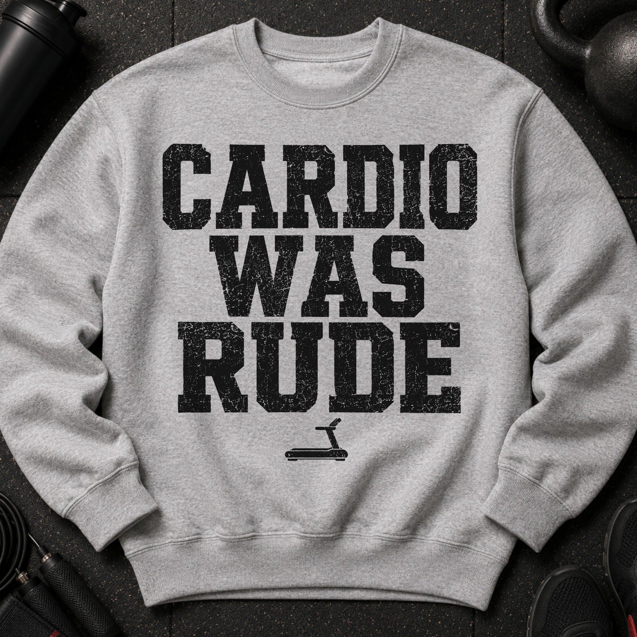 Gray sweatshirt with black distressed text that reads "CARDIO WAS RUDE" and a treadmill icon.