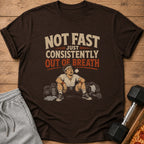 Brown t-shirt with illustration of a tired man and text "Not Fast Just Consistently Out of Breath".