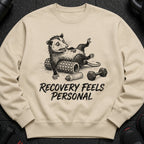 Light beige crewneck sweatshirt with graphic text and design: "RECOVERY FEELS PERSONAL."