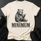 Cream t-shirt with black graphic of bear lifting dumbbell and text "MINIMUM".
