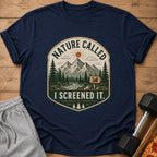 Navy t-shirt with a circular nature graphic and text: "NATURE CALLED, I SCREENED IT."
