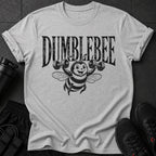 Grey t-shirt with comic-style bumblebee lifting dumbbells and text "DUMBLEBEE"
