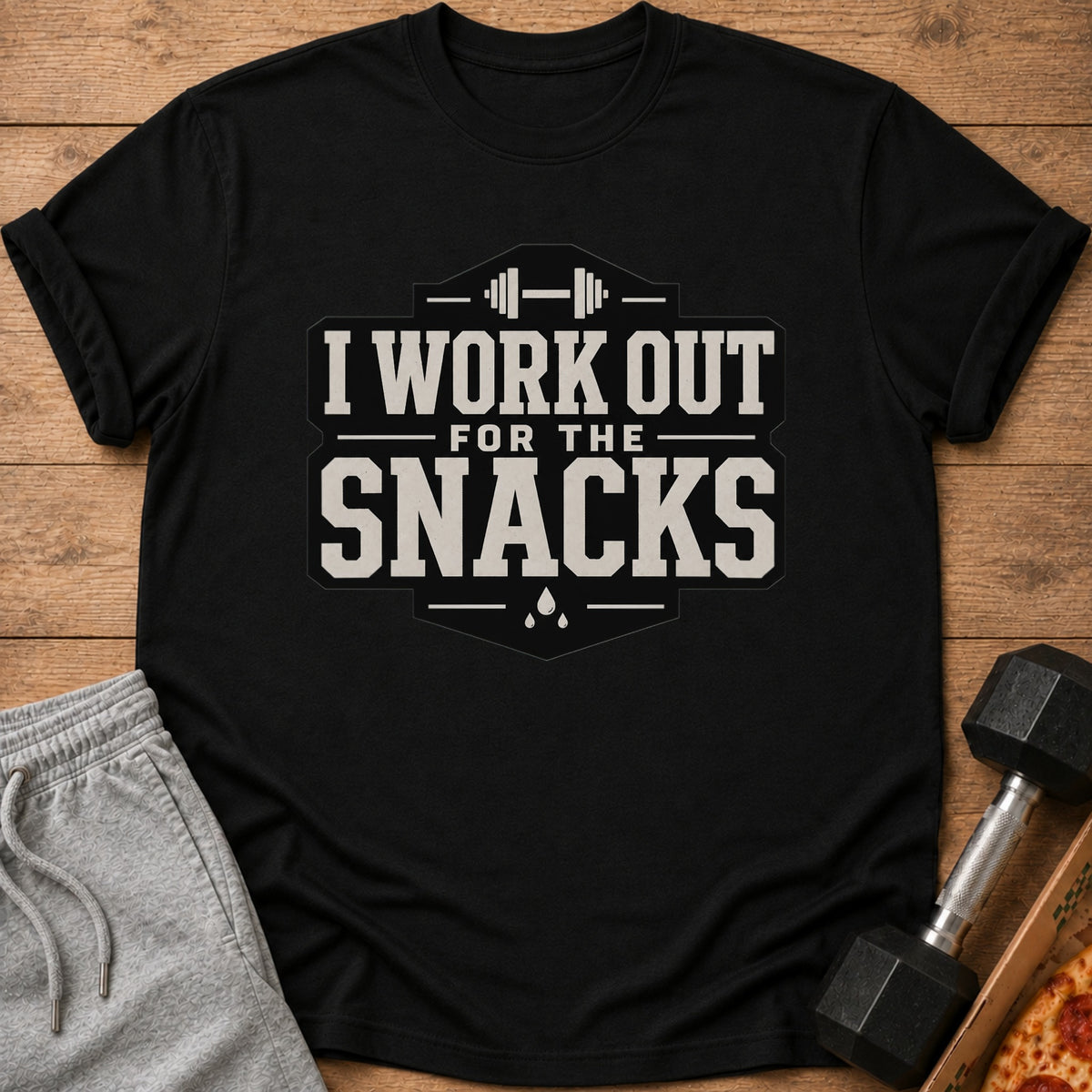 Black t-shirt with "I Work Out For The Snacks" graphic, dumbbell, and pizza.