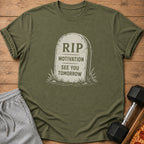 Olive green t-shirt with tombstone graphic saying "RIP MOTIVATION SEE YOU TOMORROW."
