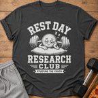 Dark grey t-shirt with "Rest Day Research Club Studying The Couch" text and cartoon.