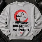 Grey sweatshirt with graphic of treadmill, red circle, and text "BREATHING IS THE WORKOUT".