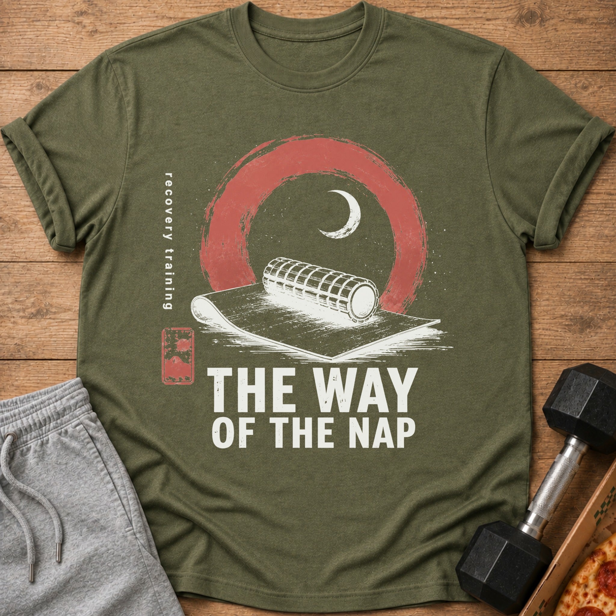 Olive green t-shirt with "The Way of the Nap" graphic, yoga mat, moon, and text.