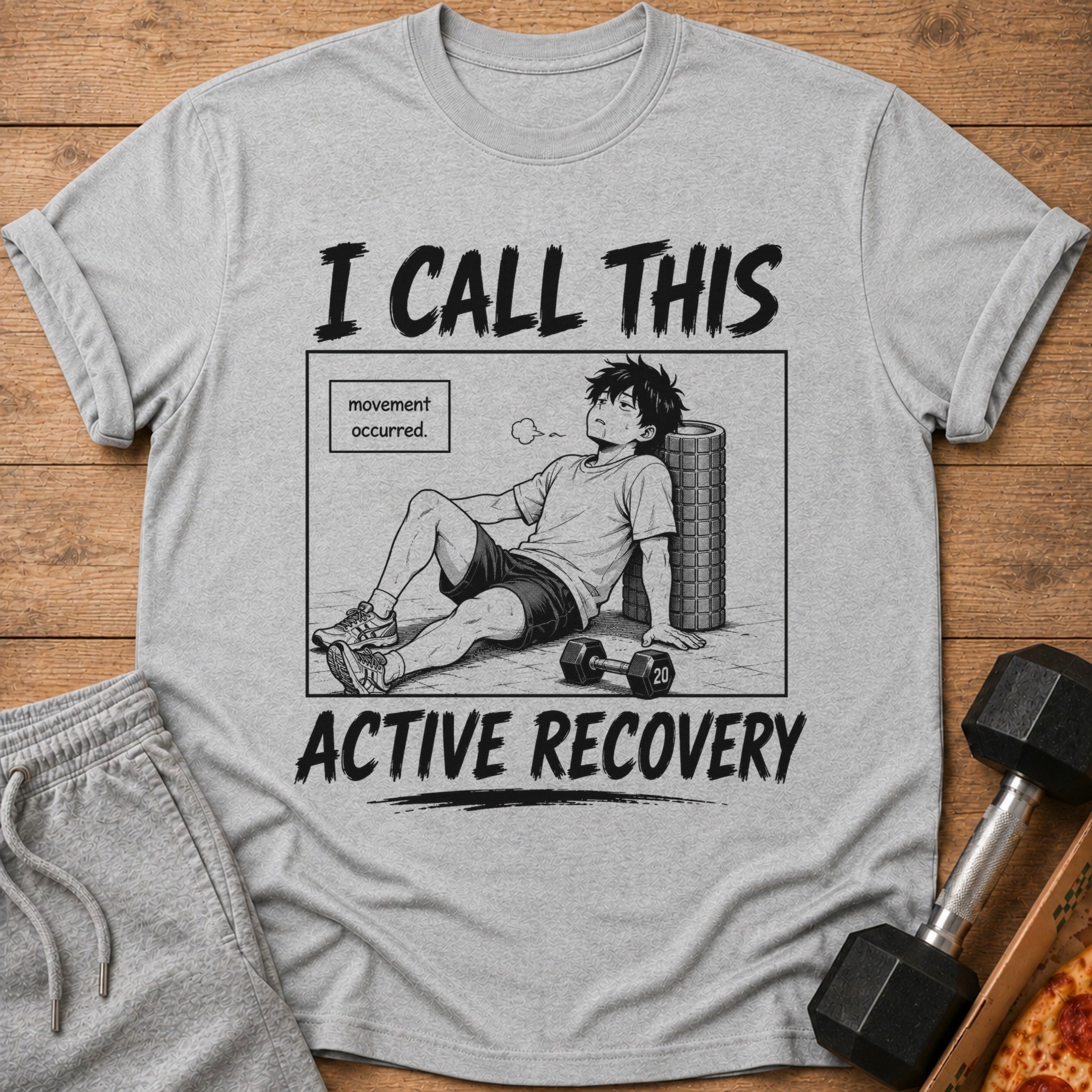 Grey t-shirt with manga graphic saying "I CALL THIS ACTIVE RECOVERY."