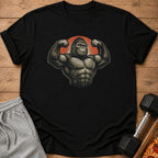Black t-shirt with muscular gorilla graphic, next to grey sweatpants and dumbbell.