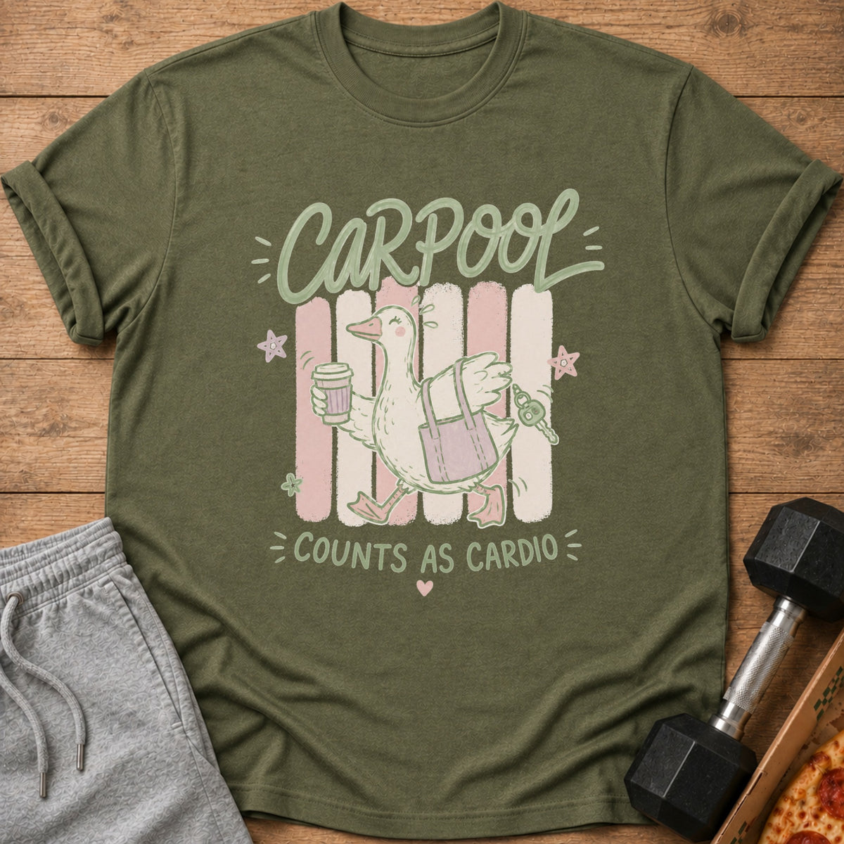 Cartoon duck with coffee and keys on green t-shirt reads "CARPOOL COUNTS AS CARDIO."