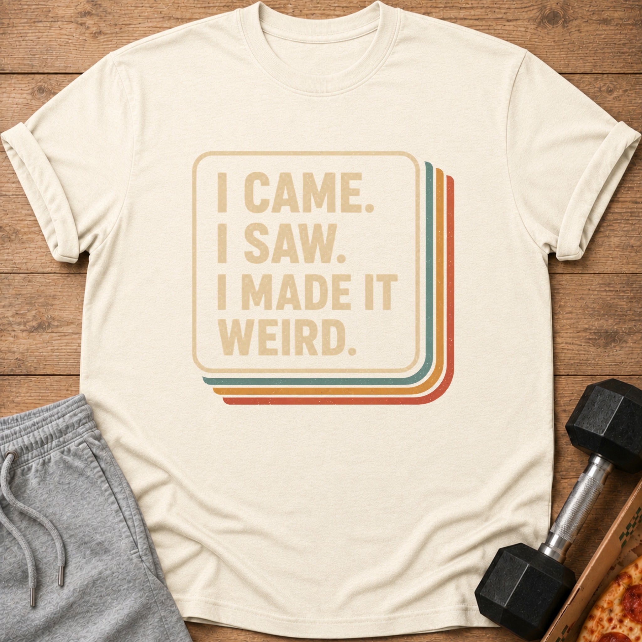 Cream t-shirt with retro text "I CAME. I SAW. I MADE IT WEIRD."