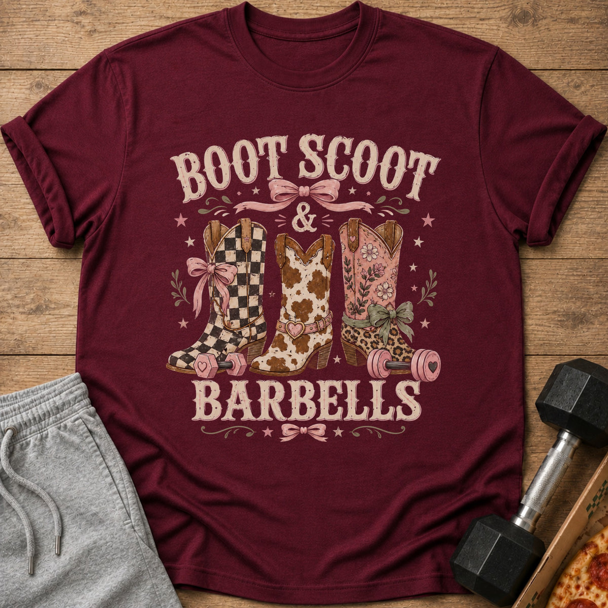 Maroon t-shirt with "Boot Scoot & Barbell" text and three decorated cowboy boots.