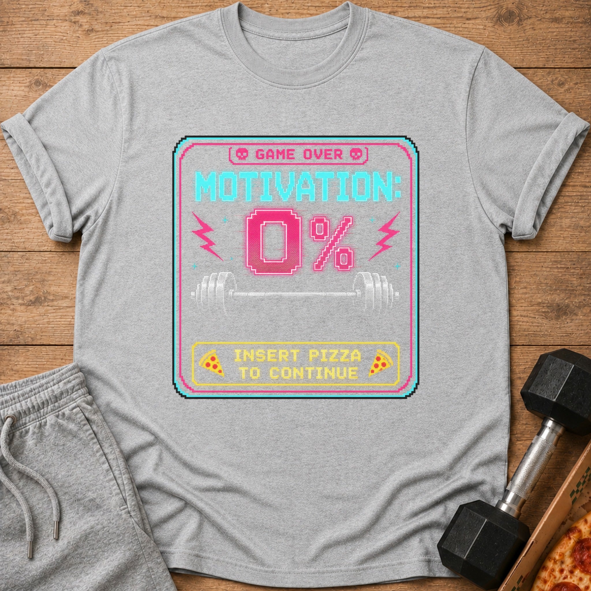 Grey t-shirt graphic with "Game Over Motivation: 0%" and "Insert Pizza To Continue".