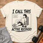 Cream t-shirt with anime art of tired man and text "I CALL THIS ACTIVE RECOVERY".