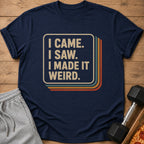 Navy t-shirt with "I came. I saw. I made it weird." text in vintage style.