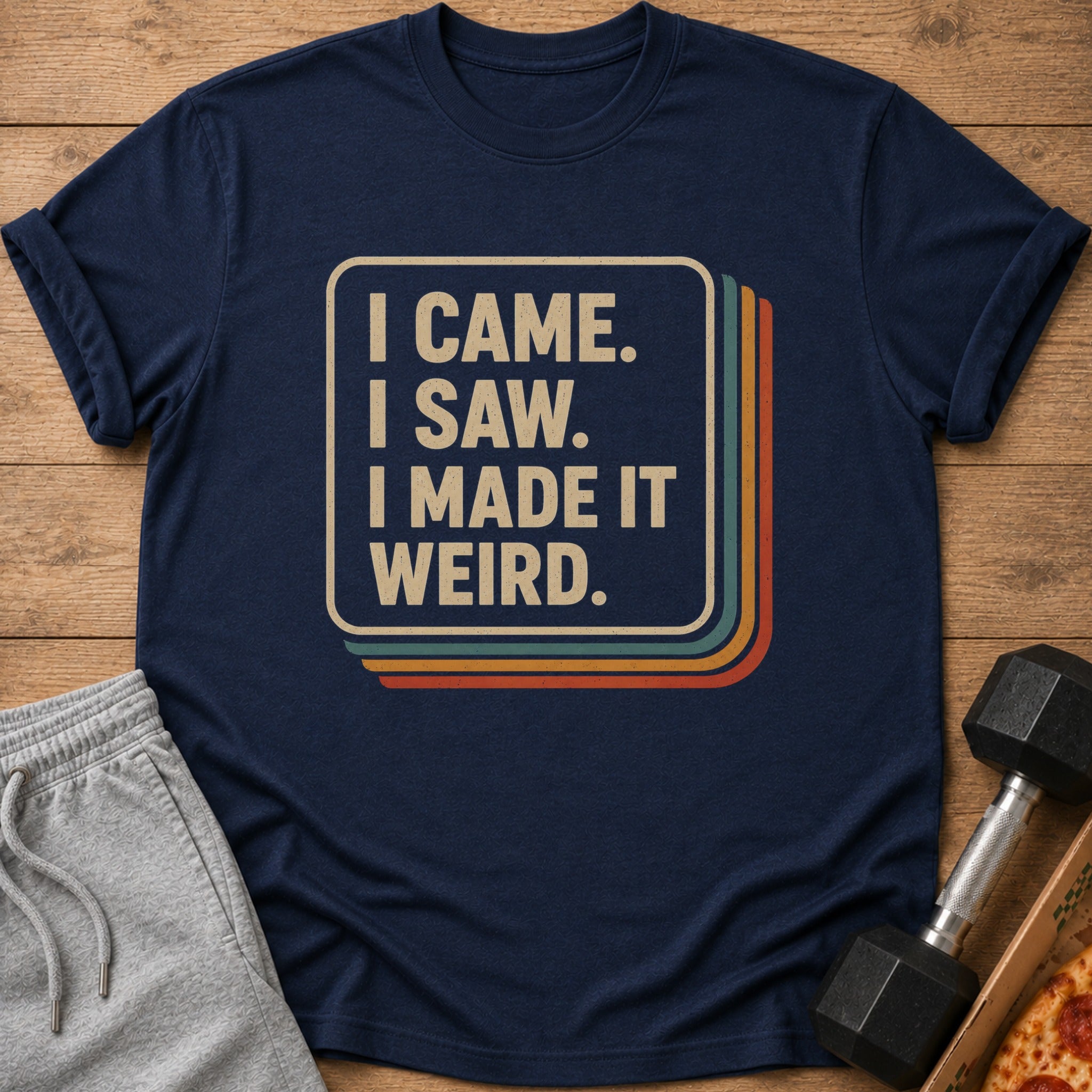 Navy t-shirt with "I came. I saw. I made it weird." text in vintage style.