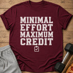 Maroon t-shirt with text "MINIMAL EFFORT MAXIMUM CREDIT" and a checkmark icon.