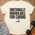 Cream t-shirt with "EMOTIONALLY UNAVAILABLE FOR CARDIO" text and treadmill graphic.