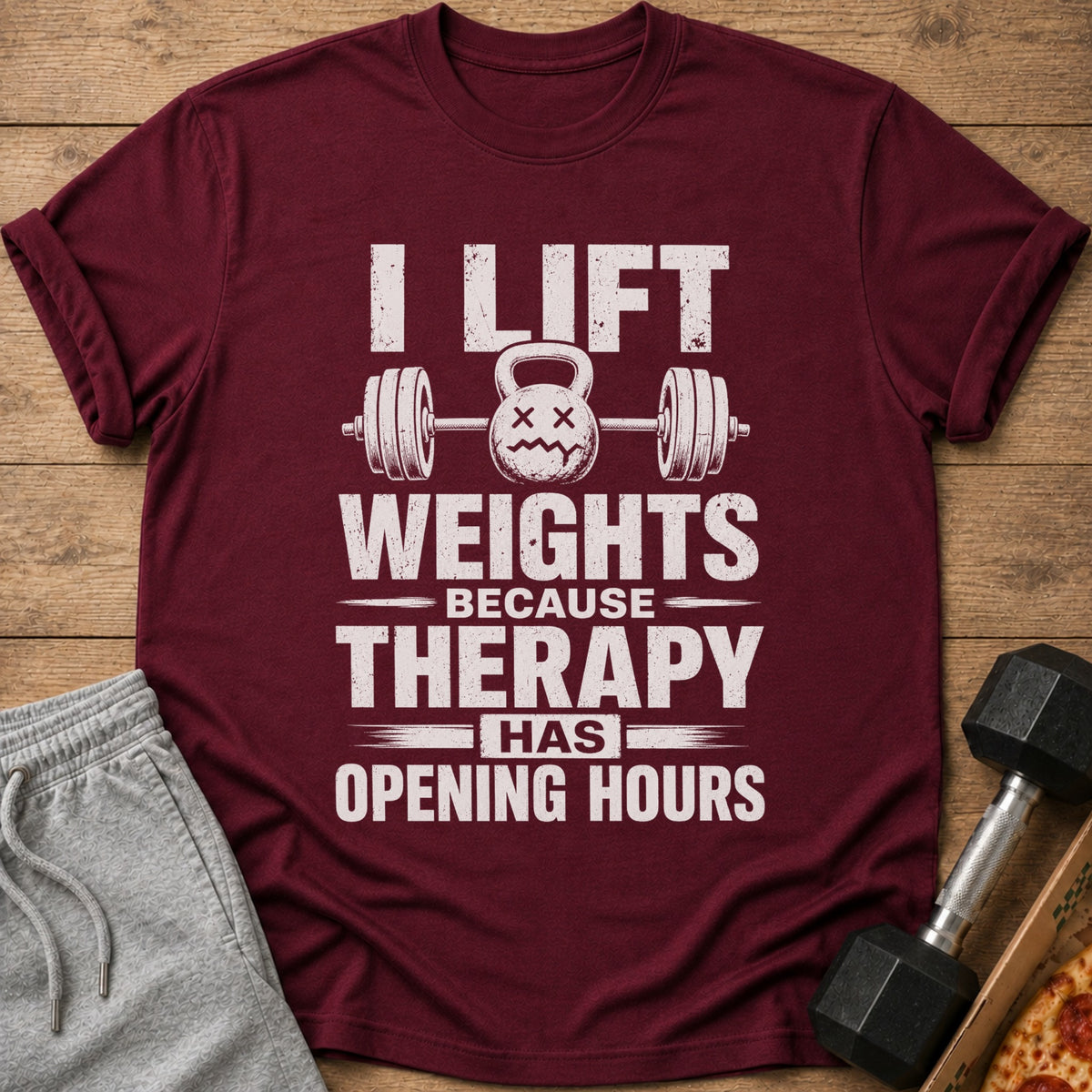 Maroon t-shirt with "I lift weights because therapy has opening hours" text.