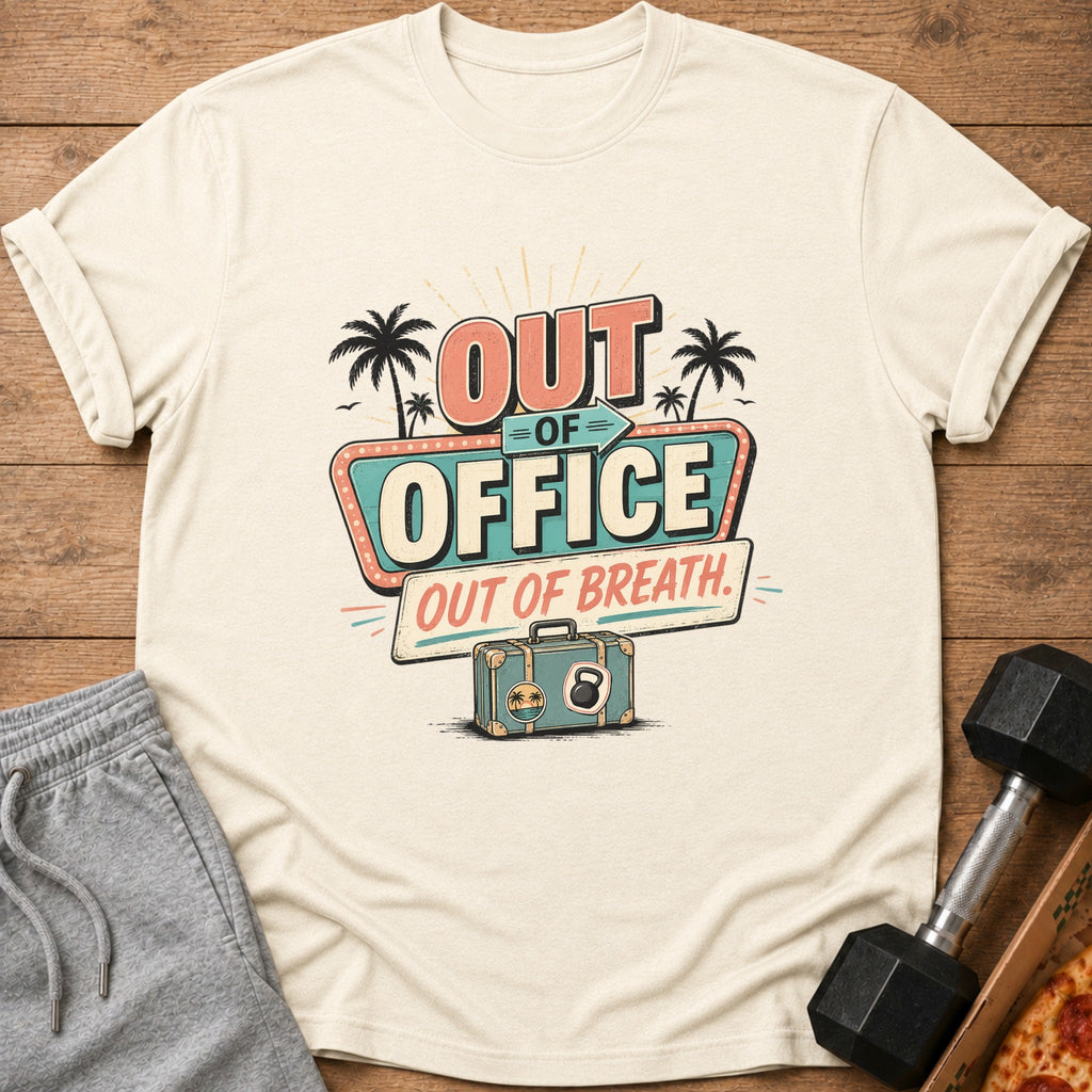 "Out of Office Out of Breath" text graphic on a tan t-shirt with suitcase and dumbbells.