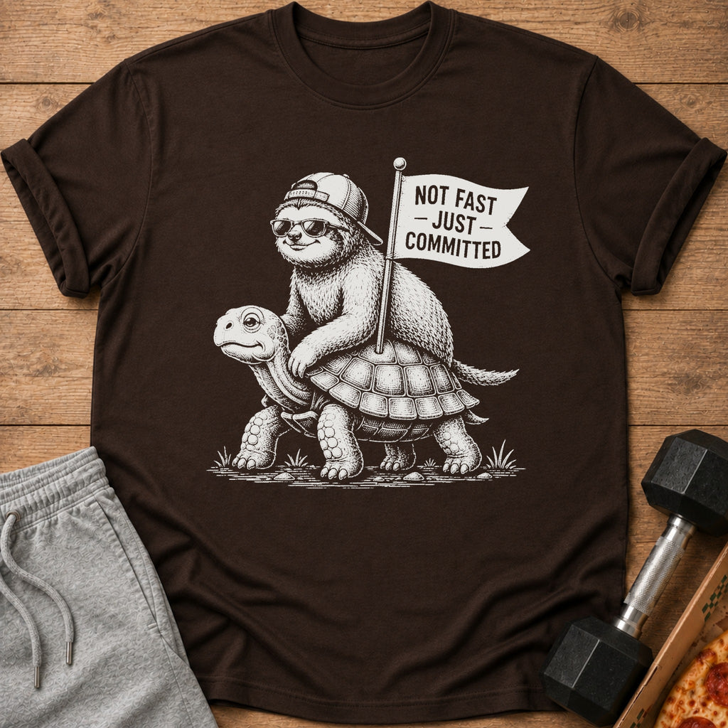 Sloth riding a turtle, holding a "Not Fast - Just Committed" flag.