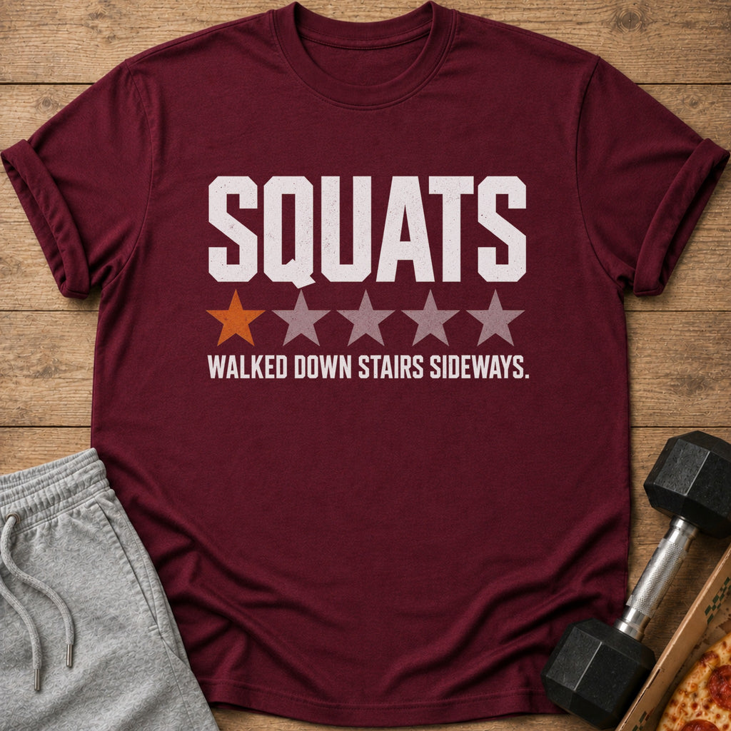Maroon t-shirt with white text "SQUATS" and one orange star and four gray stars.