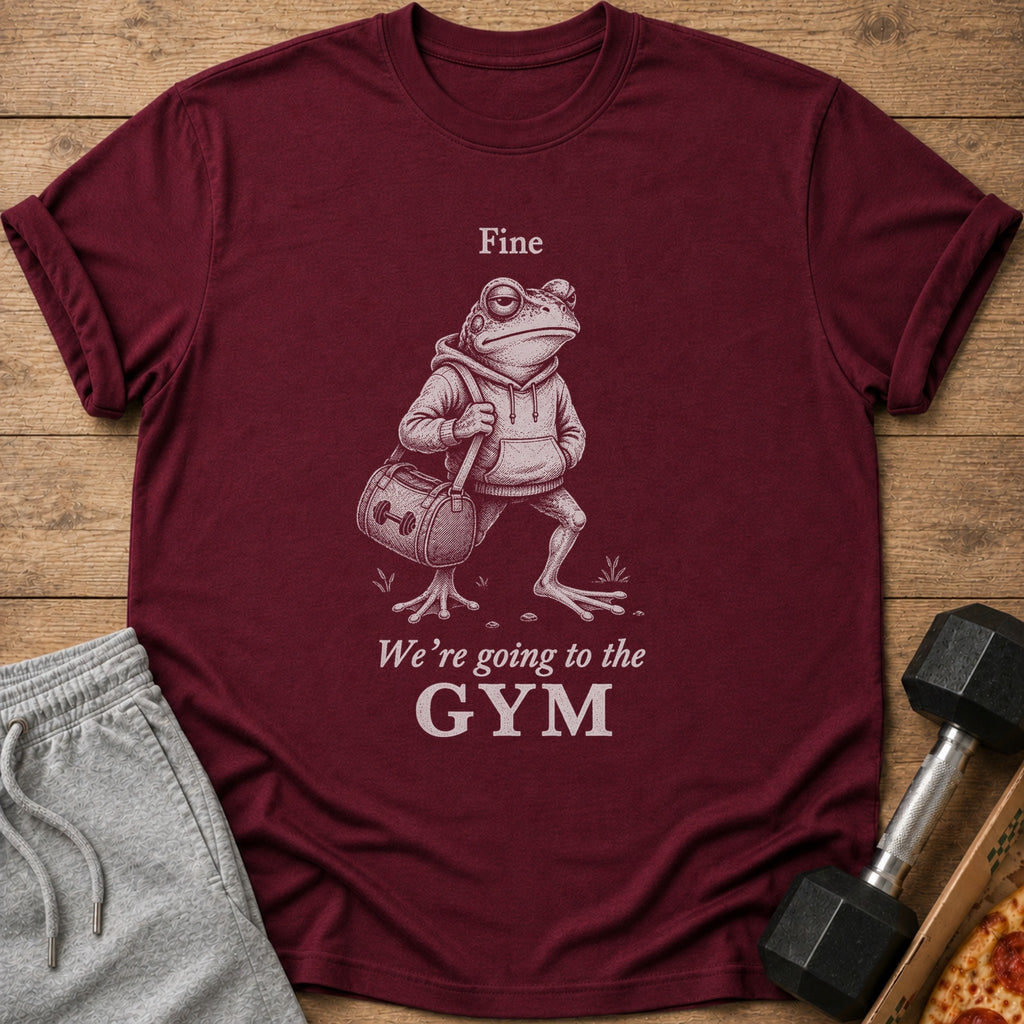 Maroon t-shirt with a frog illustration and text "Fine We're going to the GYM".
