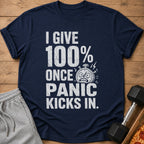 Navy t-shirt with "I GIVE 100% ONCE PANIC KICKS IN." text and a stressed stopwatch.