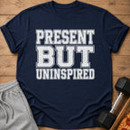 Navy t-shirt with white distressed text "PRESENT BUT UNINSPIRED".