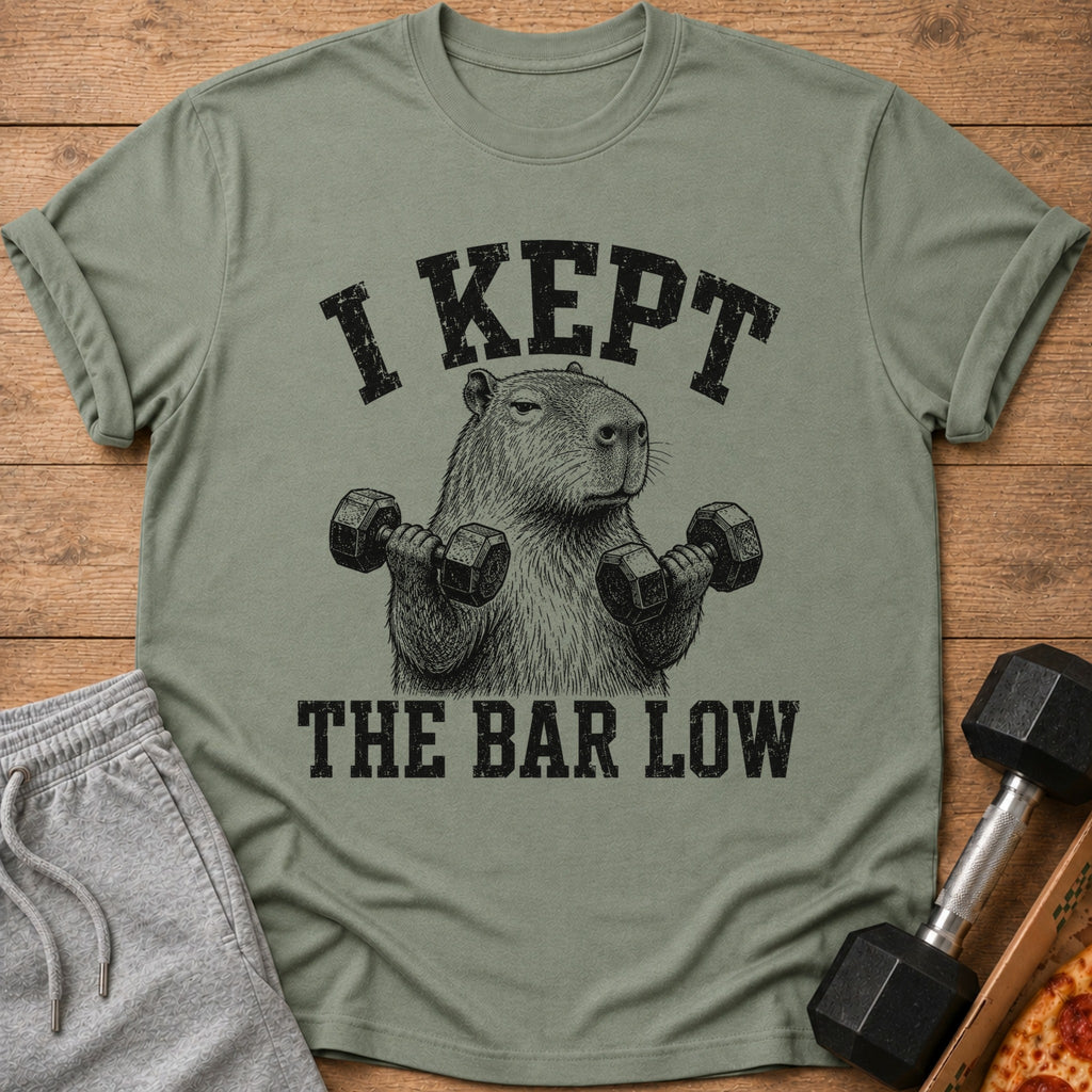 Capybara lifting dumbbells with text "I KEPT THE BAR LOW".