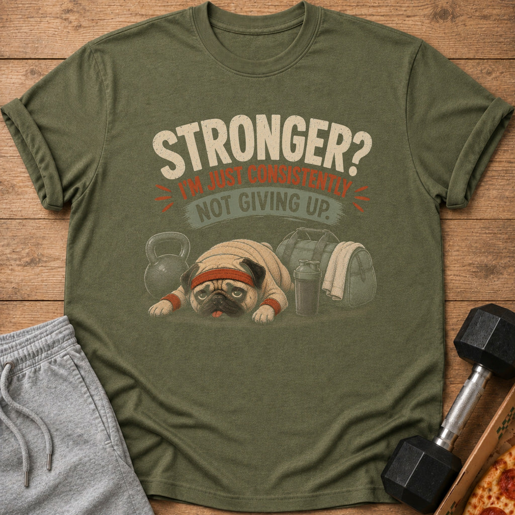 Olive green t-shirt with pug wearing headband and text "Stronger? I'm Just Consistently Not Giving Up."