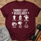 Maroon t-shirt with "Things I Lift Regularly" and humorous icons.