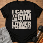 Black t-shirt with "I CAME TO THE GYM TO LOWER MY STANDARDS" graphic.