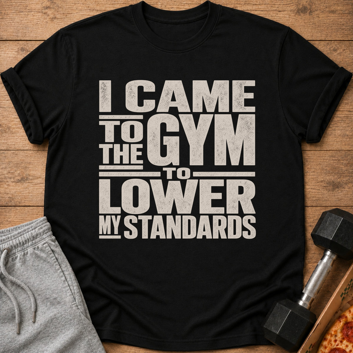Black t-shirt with "I CAME TO THE GYM TO LOWER MY STANDARDS" graphic.