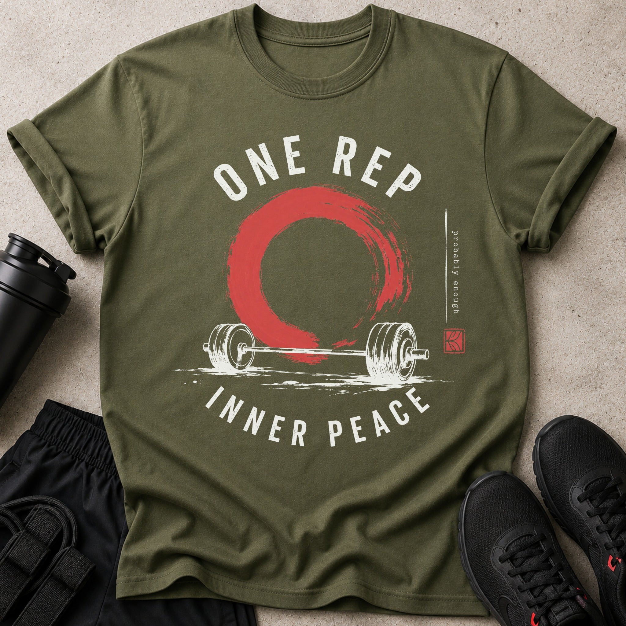 Olive green t-shirt with "One Rep Inner Peace" barbell design and red zen circle.