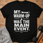 Black t-shirt with text "MY WARM-UP WAS THE MAIN EVENT" and graphics.