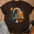 Brown t-shirt with graphic of chess pieces and workout/relaxation items on a chessboard.