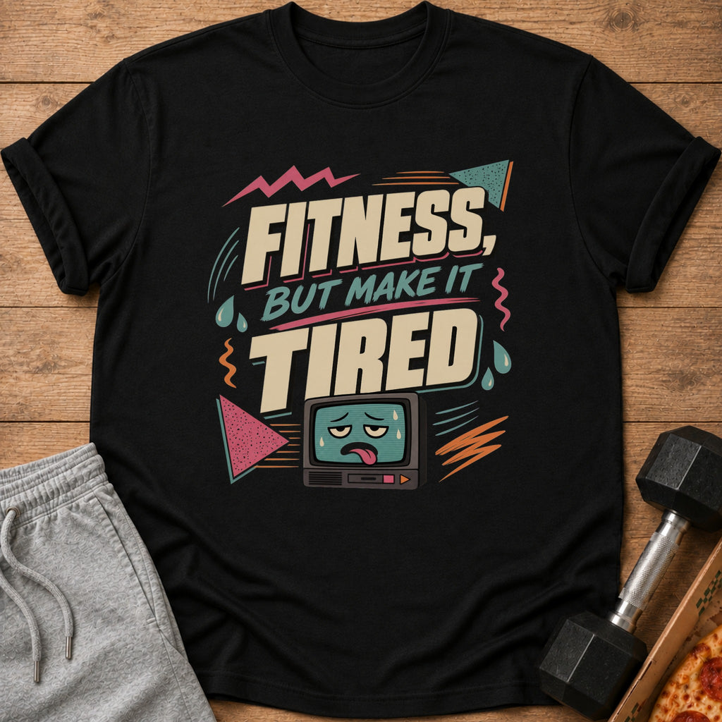 Black t-shirt with "Fitness, But Make It Tired" text and a tired cartoon TV.
