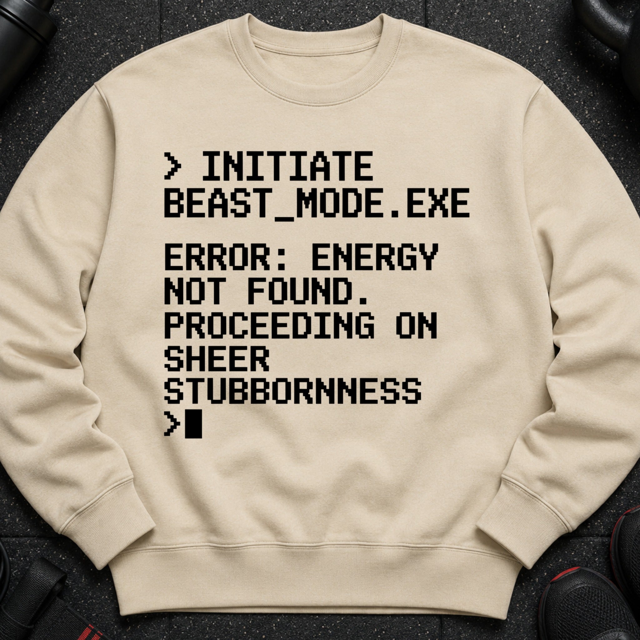 Tan sweatshirt with black pixelated text: Initiate Beast Mode, Error: Energy Not Found.