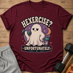Maroon t-shirt with a distressed graphic of a ghost lifting weights and text "HEXERCISE? UNFORTUNATELY."