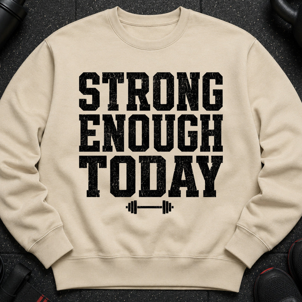 Beige sweatshirt with black distressed "STRONG ENOUGH TODAY" text and barbell graphic.