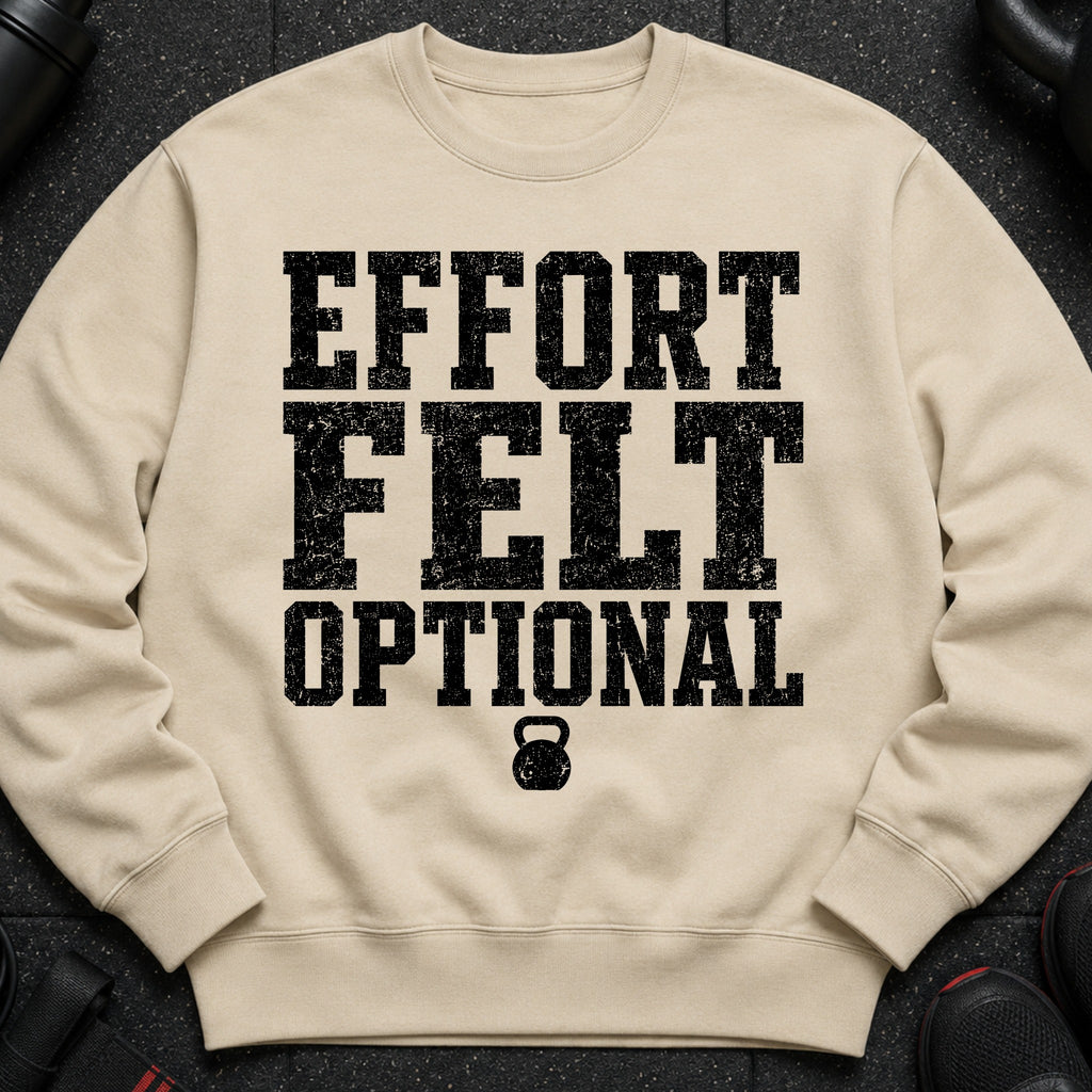 Tan sweatshirt with black distressed text "EFFORT FELT OPTIONAL" and a kettlebell graphic.