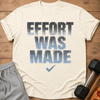 Cream t-shirt with text "EFFORT WAS MADE" and a checkmark.