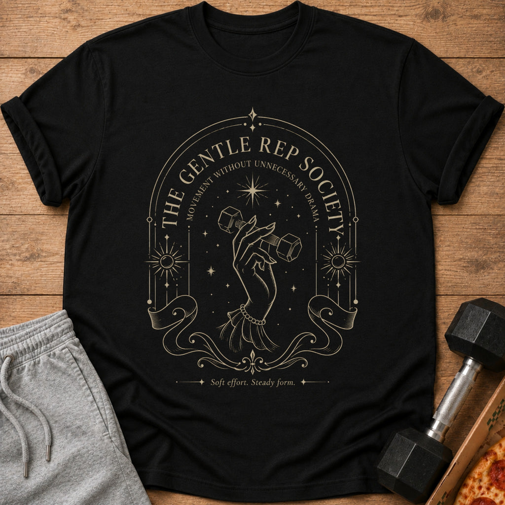 Black t-shirt with gold graphic: hand holding dumbbell, text: The Gentle Rep Society, Movement Without Unnecessary Drama.