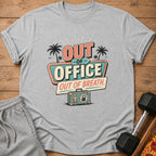 Grey t-shirt with "Out of Office, Out of Breath" text and suitcase graphic.