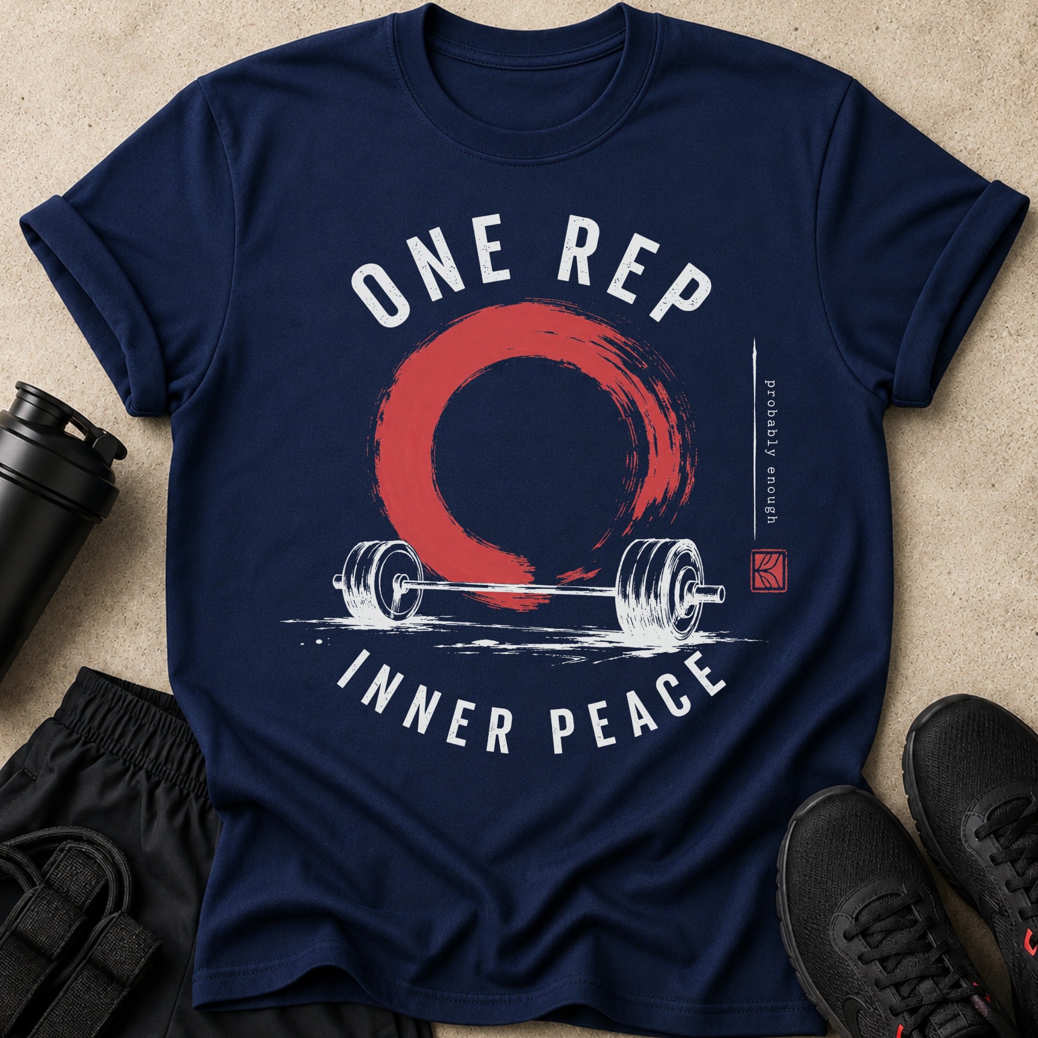 Navy t-shirt with "ONE REP INNER PEACE" text, barbell, and red circle graphic.