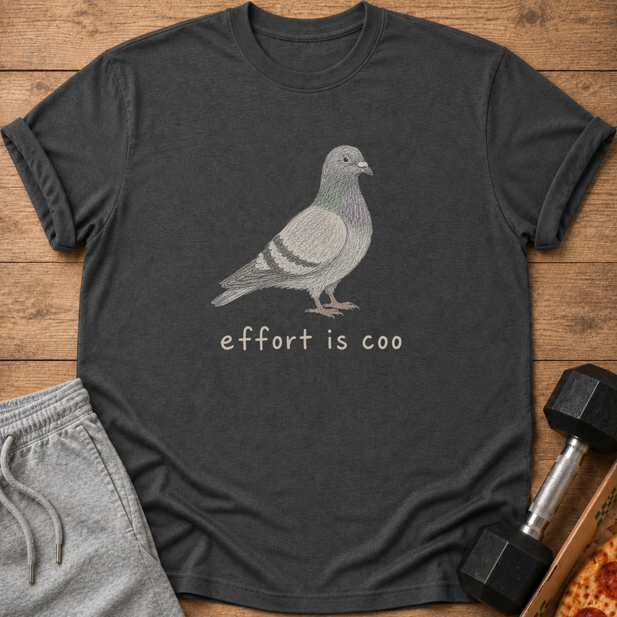 Charcoal t-shirt with pigeon graphic and text "effort is coo"