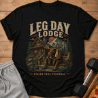 Black t-shirt with "LEG DAY LODGE" and a moose on stairs.