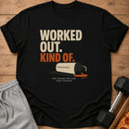 Black t-shirt with text "WORKED OUT. KIND OF." and spilled shake graphic.