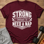 Maroon t-shirt with white text "STRONG ENOUGH TO NEED A NAP."